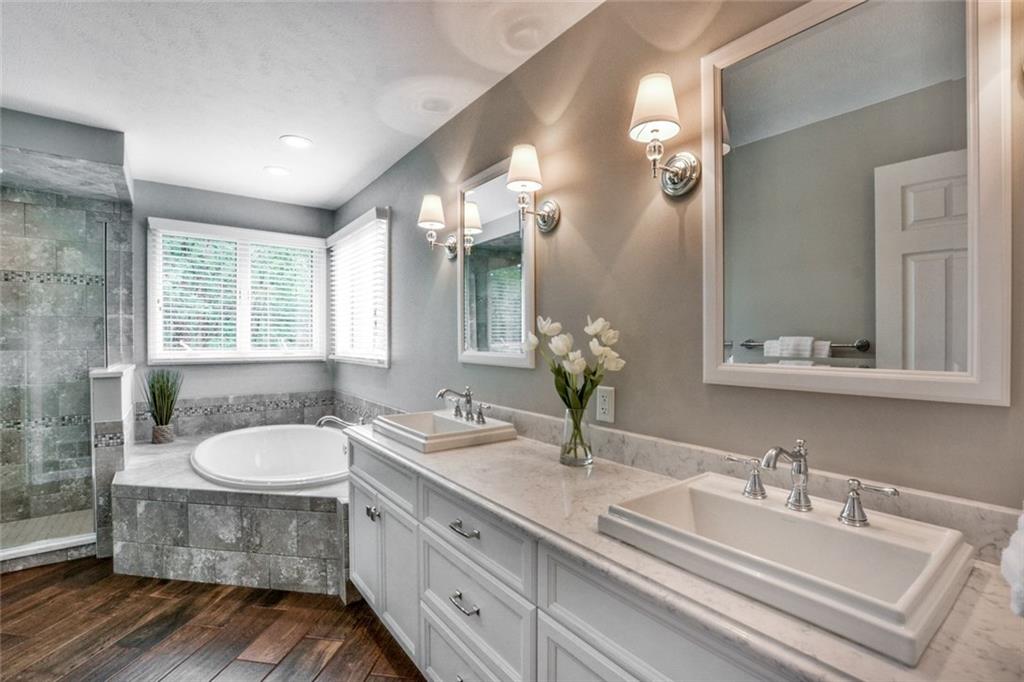 322 Stoup Road Mars, PA 16046 - Photo 17 of 25 a bathroom with a granite countertop double vanity sink and mirror