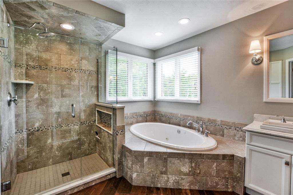 322 Stoup Road Mars, PA 16046 - Photo 18 of 25 a bathroom with a sink shower and a mirror