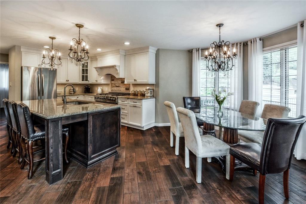 322 Stoup Road Mars, PA 16046 - Photo 6 of 25 a view of a dining room with furniture window and wooden floor