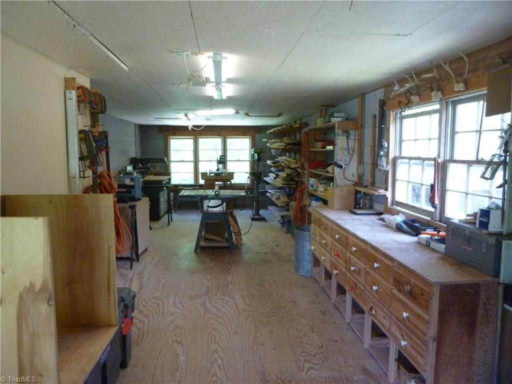 1476 Barker Road Roaring River, NC 28669 - Photo 16 of 29 Workshop with attached Greenhouse.