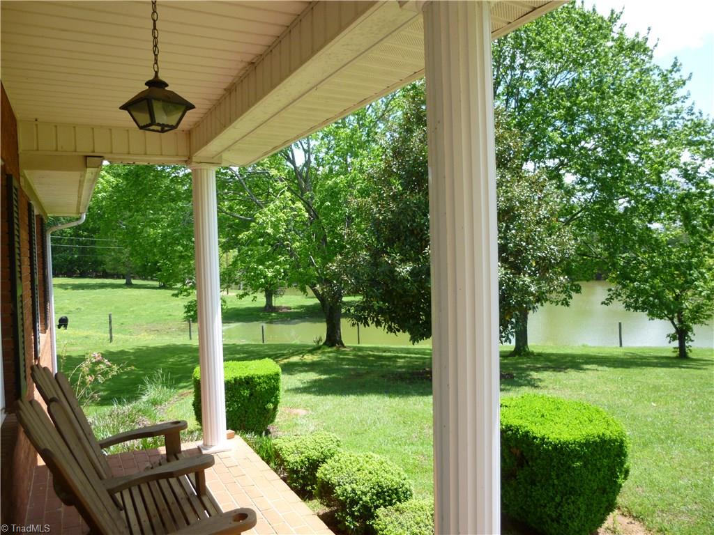 1476 Barker Road Roaring River, NC 28669 - Photo 23 of 29 Front porch view of pond to left.