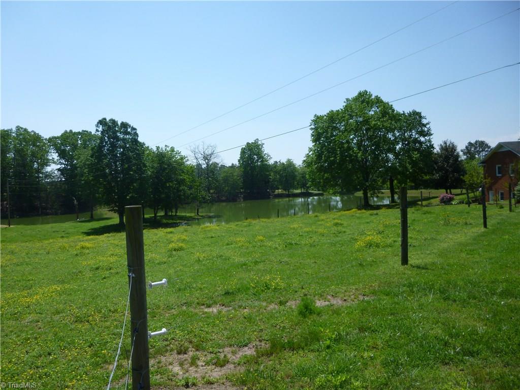 1476 Barker Road Roaring River, NC 28669 - Photo 25 of 29 View from left side of Hay Barn toward end house and pond.