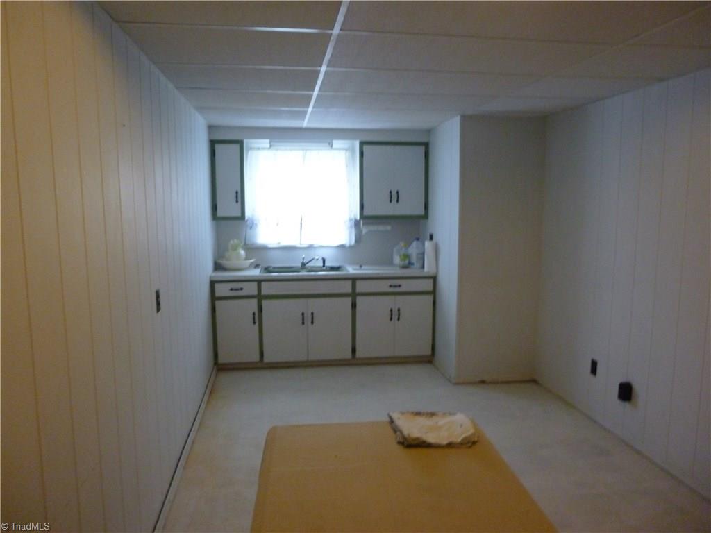 1476 Barker Road Roaring River, NC 28669 - Photo 28 of 29 Kitchen in basement needs flooring and some updating. NOT included in heated square footage shown.
