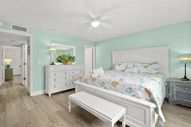 a bedroom with a bed and a dresser