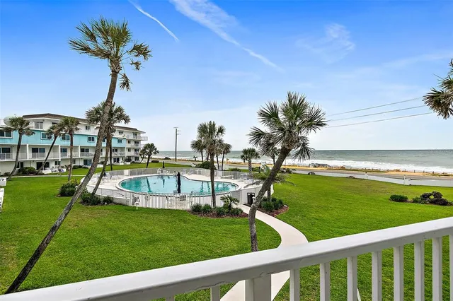 a view of a garden with a fountain