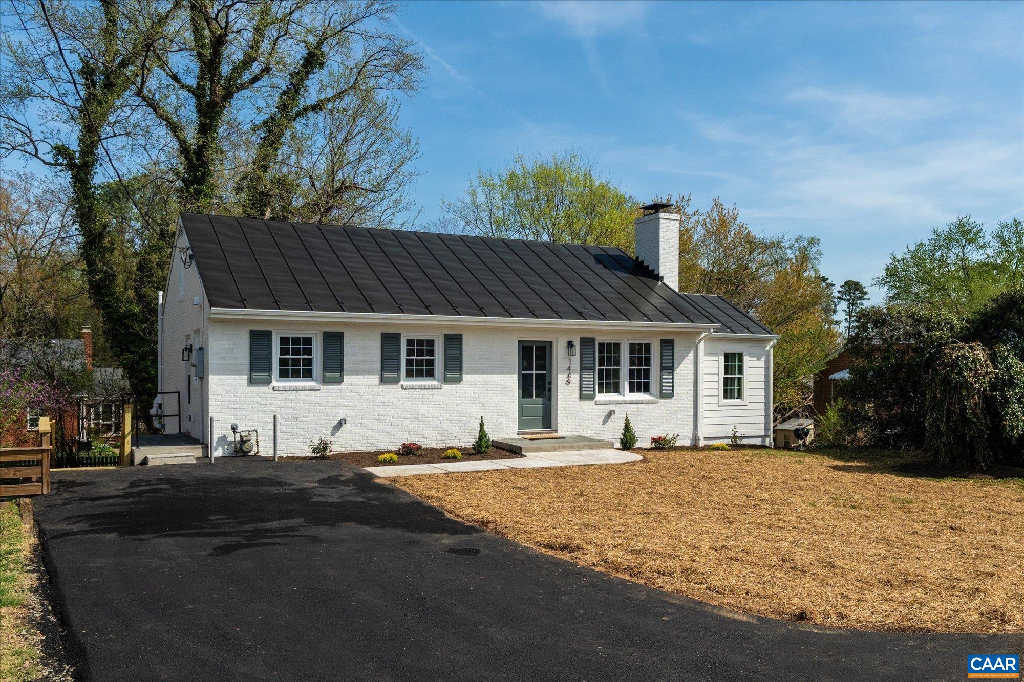 1449 Rutledge Avenue Charlottesville, VA 22903 - Photo 1 of 46 a front view of a house with a yard