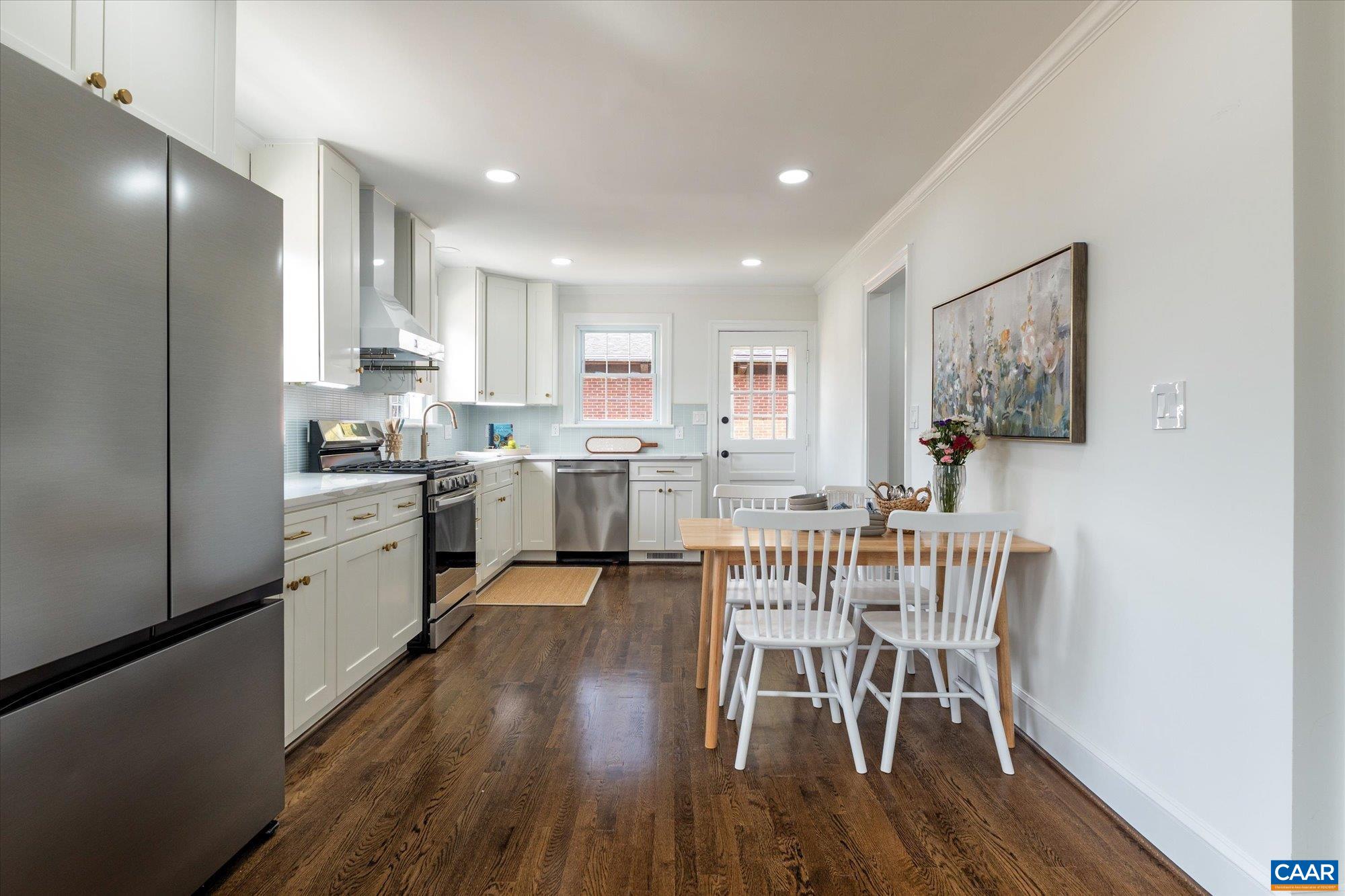 1449 Rutledge Avenue Charlottesville, VA 22903 - Photo 13 of 46 a view of kitchen with cabinets table and chairs