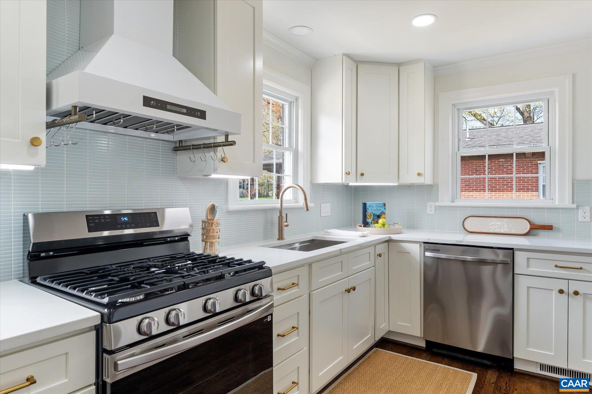 1449 Rutledge Avenue Charlottesville, VA 22903 - Photo 16 of 46 a stove top oven sitting inside of a kitchen