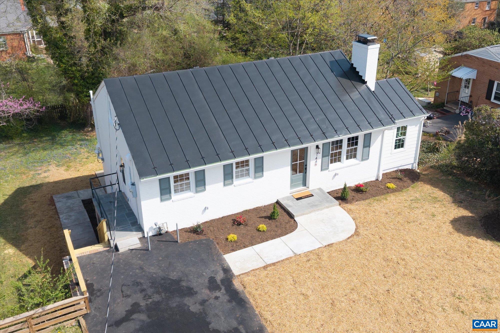 1449 Rutledge Avenue Charlottesville, VA 22903 - Photo 3 of 46 an aerial view of a house with swimming pool and sitting area