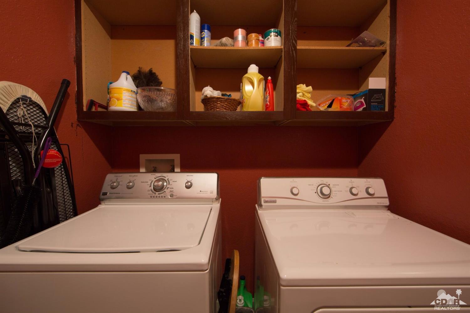 83948 Pacifica Sur Indio, CA 92203 - Photo 13 of 16 a utility room with dryer and washer