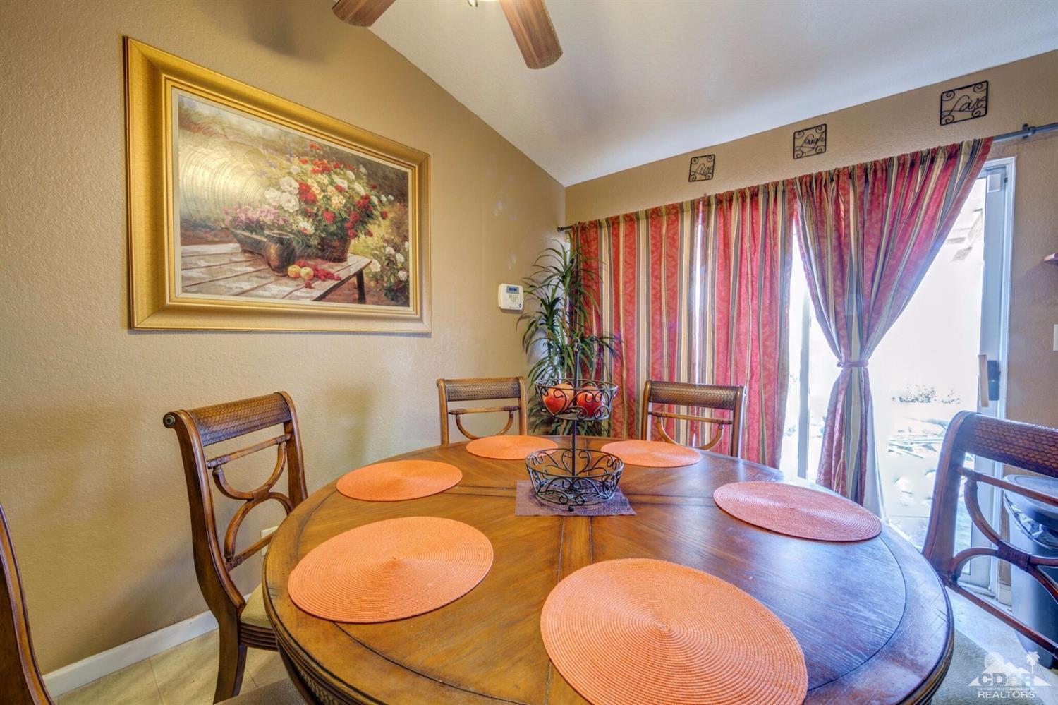 83948 Pacifica Sur Indio, CA 92203 - Photo 5 of 16 a dining room with furniture and window