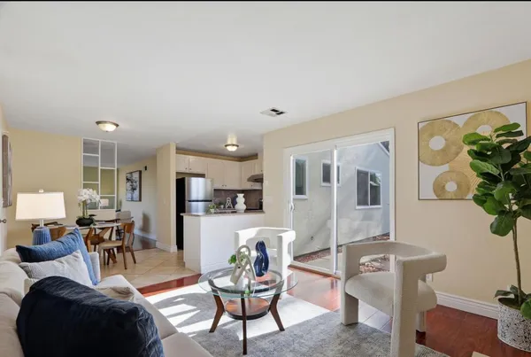 a living room with furniture and a table