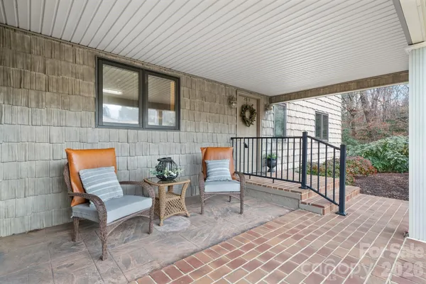 a building outdoor space with patio furniture
