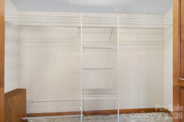 a view of a room with rack on the wall