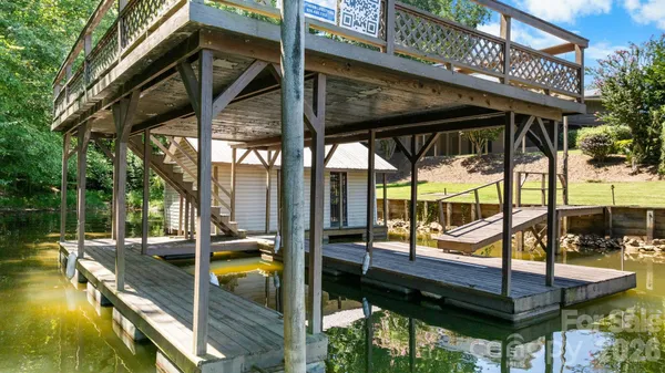 a view of swimming pool with chairs