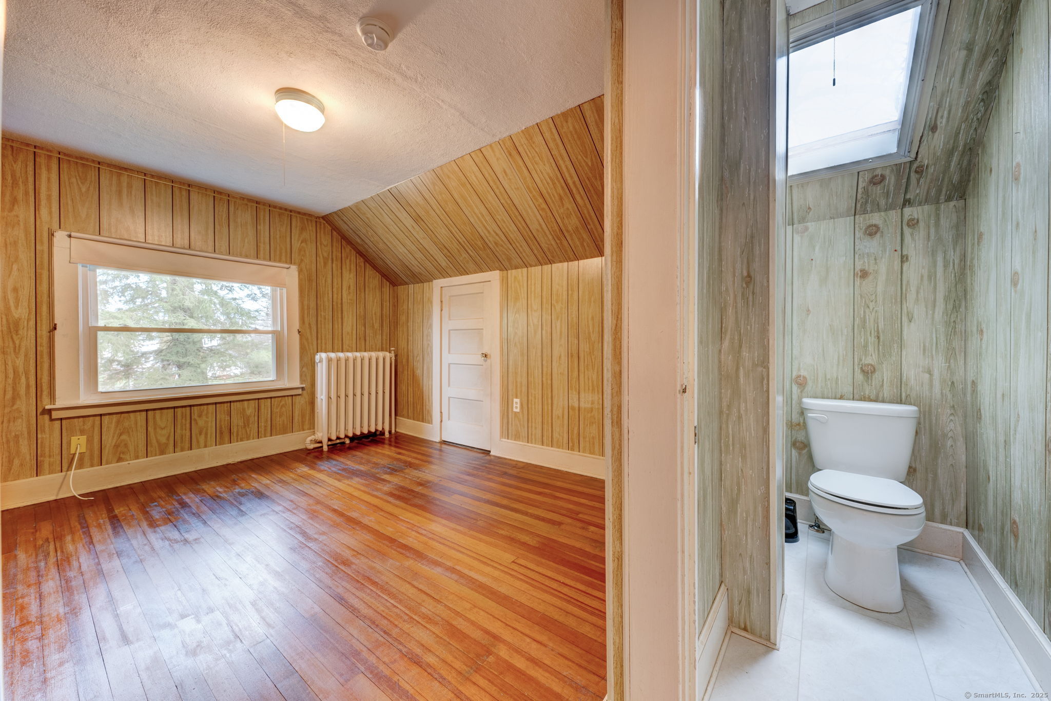 18 Hubbard Place Wethersfield, CT 06109 - Photo 11 of 21 a bathroom with a toilet sink and a mirror