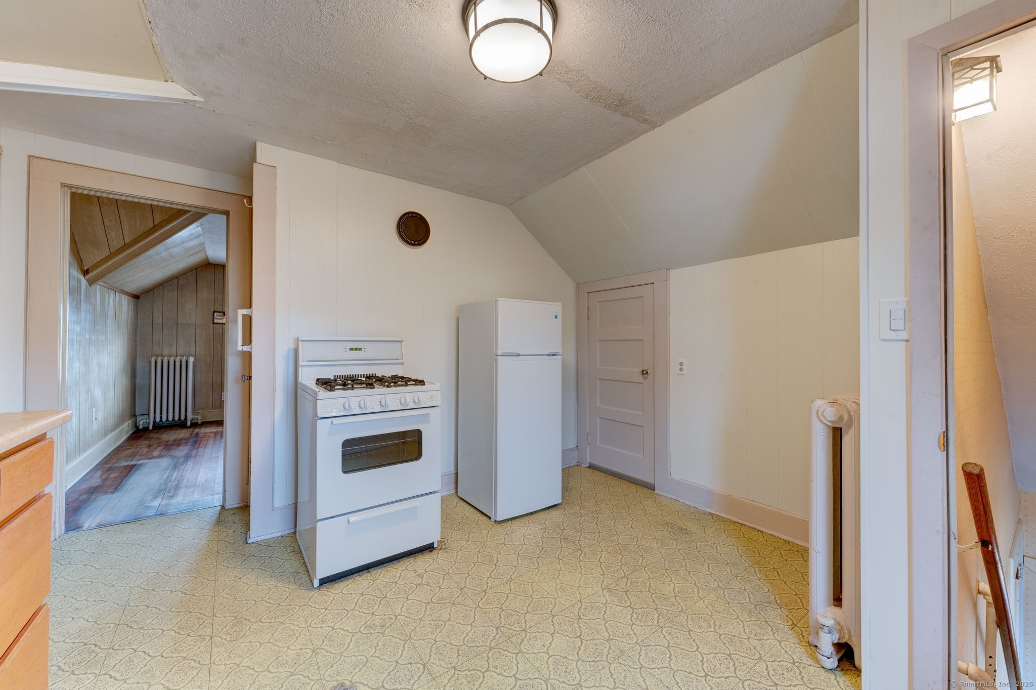 18 Hubbard Place Wethersfield, CT 06109 - Photo 13 of 21 a kitchen with a stove and a refrigerator
