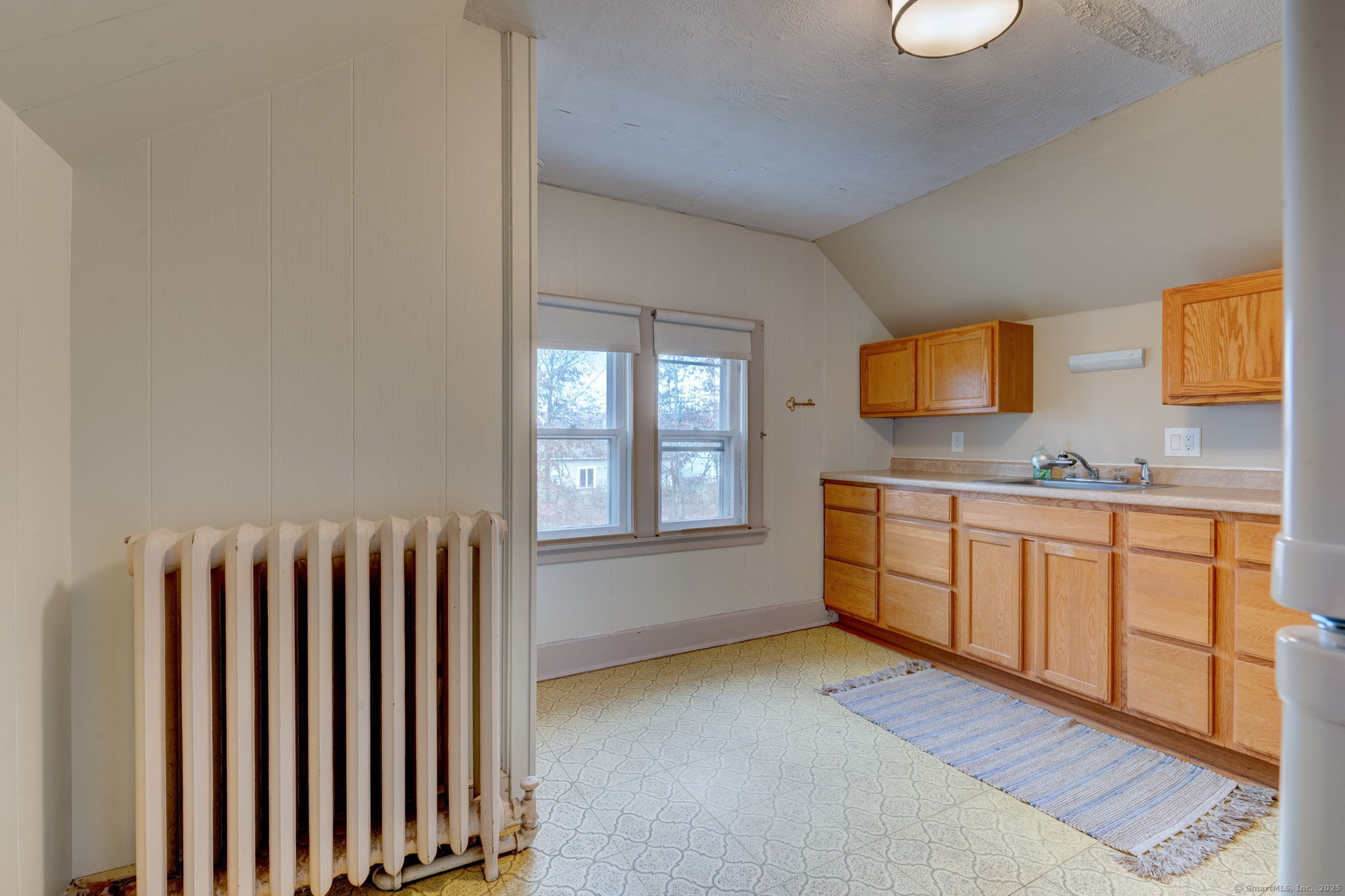 18 Hubbard Place Wethersfield, CT 06109 - Photo 15 of 21 a spacious bathroom with a double vanity sink a mirror and a bathtub