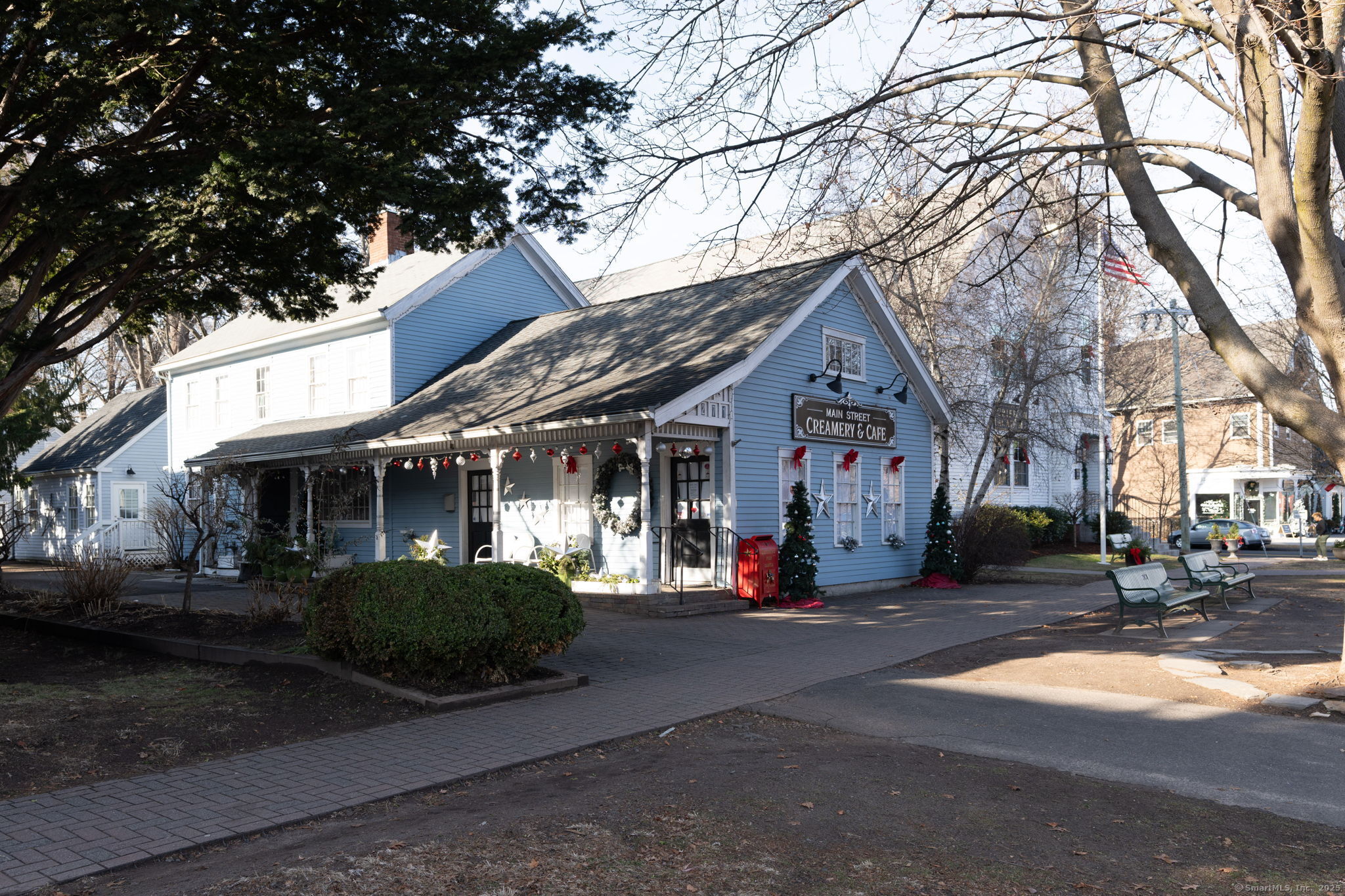 18 Hubbard Place Wethersfield, CT 06109 - Photo 17 of 21 a front view of a house with a garden