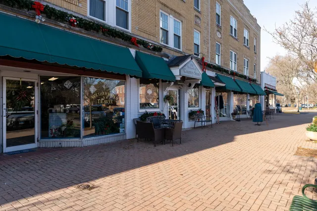 a view of street with sitting area
