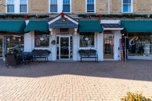 a view of a chairs and table in the patio