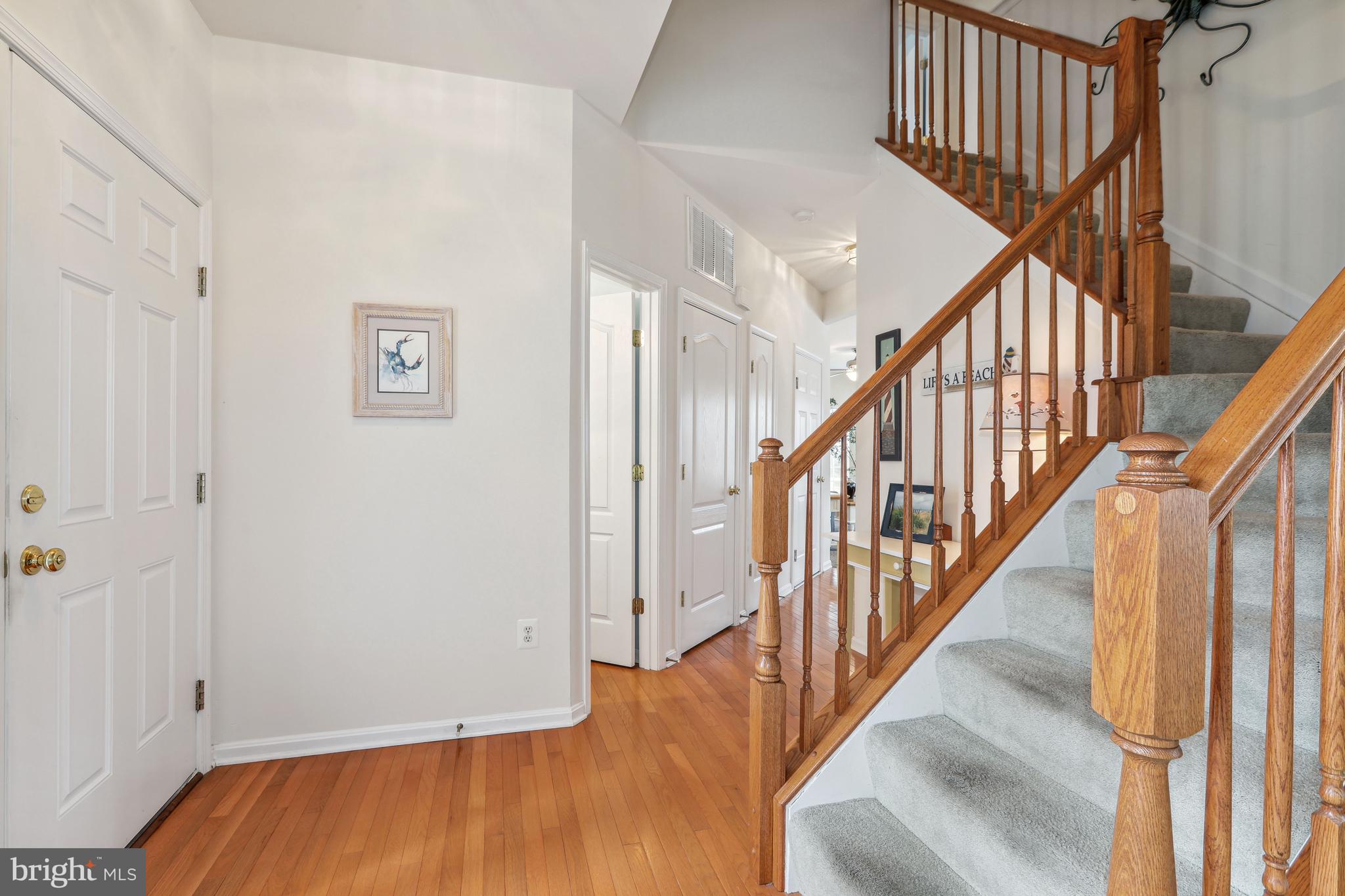 24834 Rivers Edge Road Millsboro, DE 19966 - Photo 17 of 39 Staircase to Upper Level