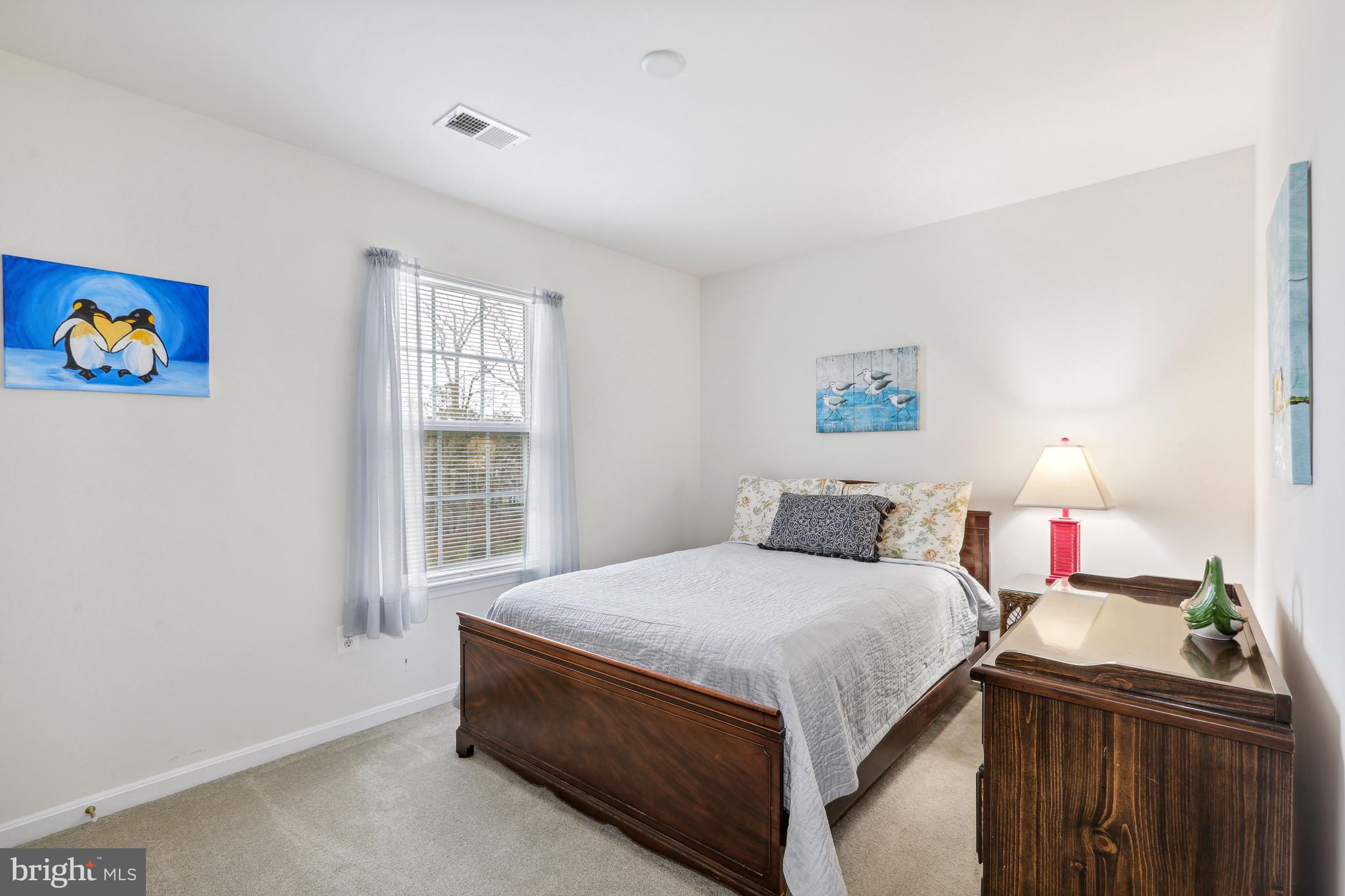 24834 Rivers Edge Road Millsboro, DE 19966 - Photo 26 of 39 Third Bedroom