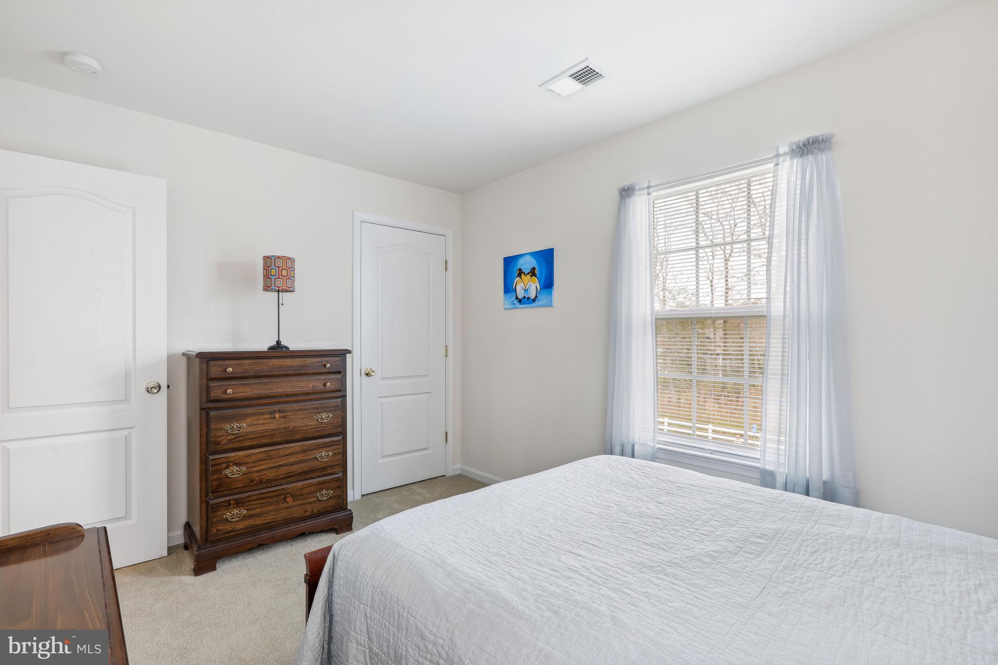 24834 Rivers Edge Road Millsboro, DE 19966 - Photo 27 of 39 Third Bedroom