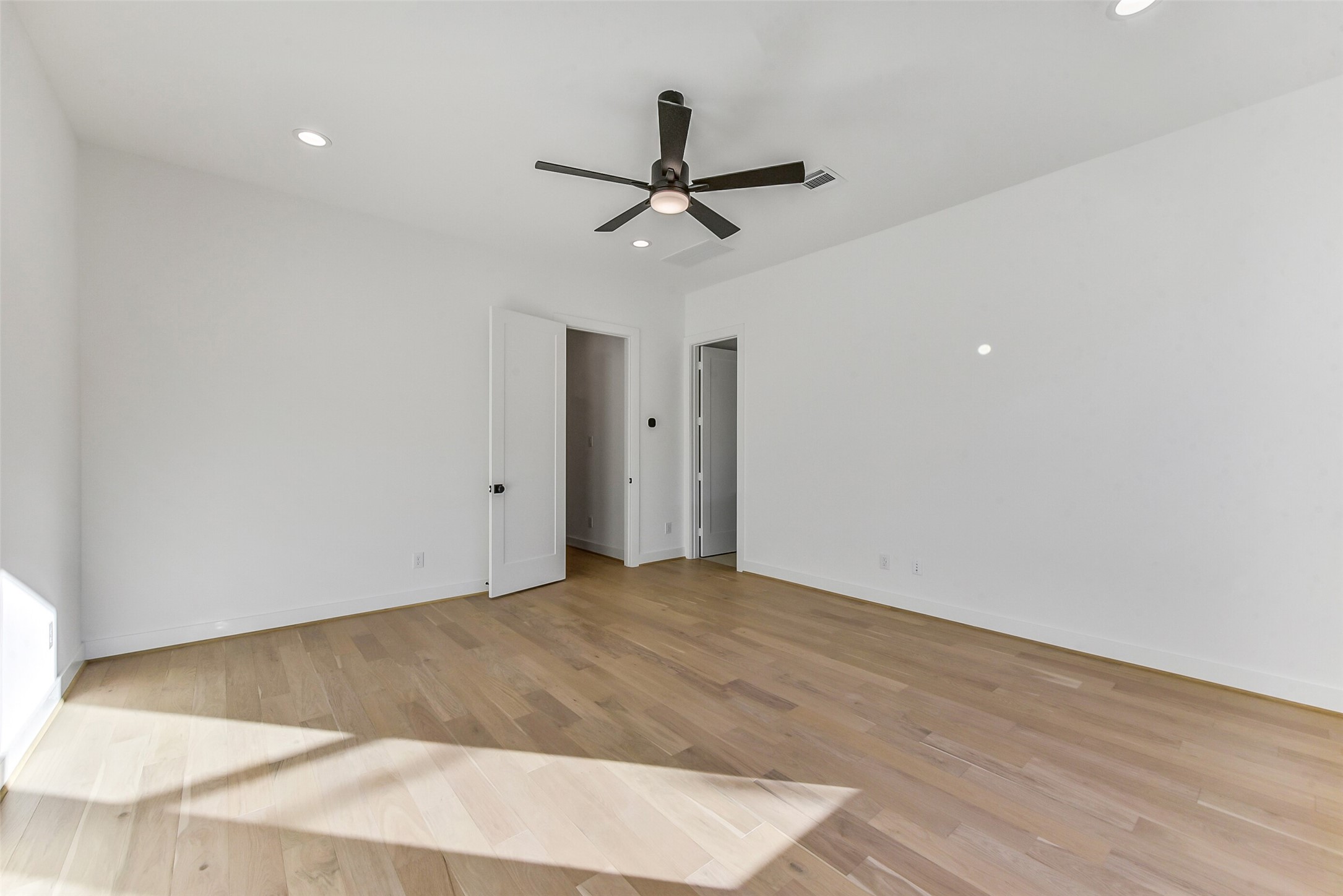 1902 Nantucket Drive Houston, TX 77057 - Photo 13 of 50 a view of empty room with ceiling fan