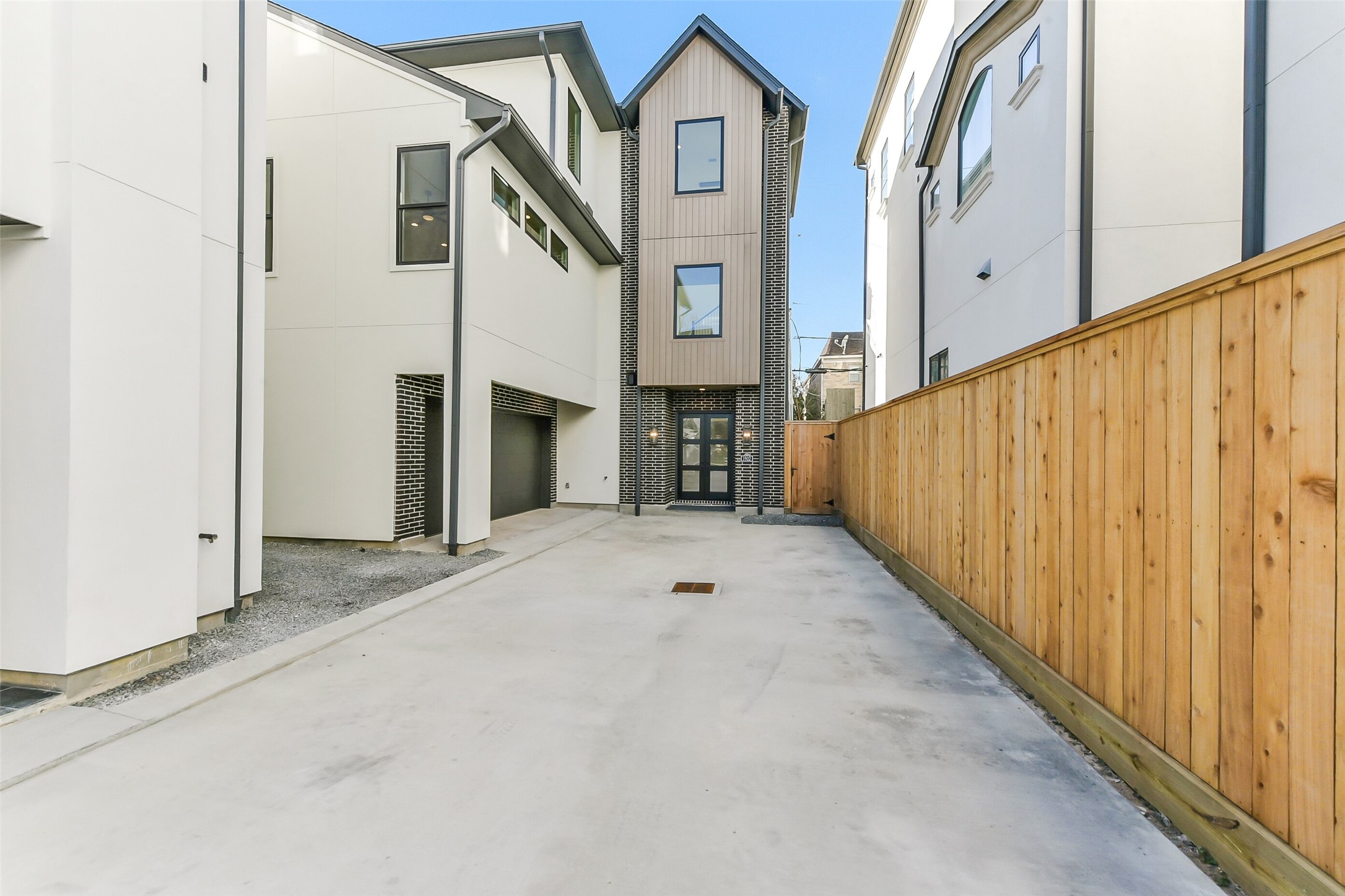 1902 Nantucket Drive Houston, TX 77057 - Photo 2 of 50 a view of a street with a building