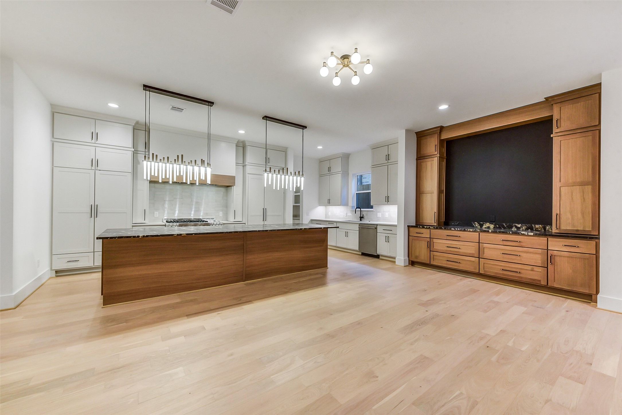 1902 Nantucket Drive Houston, TX 77057 - Photo 35 of 50 a living room with furniture and a flat screen tv