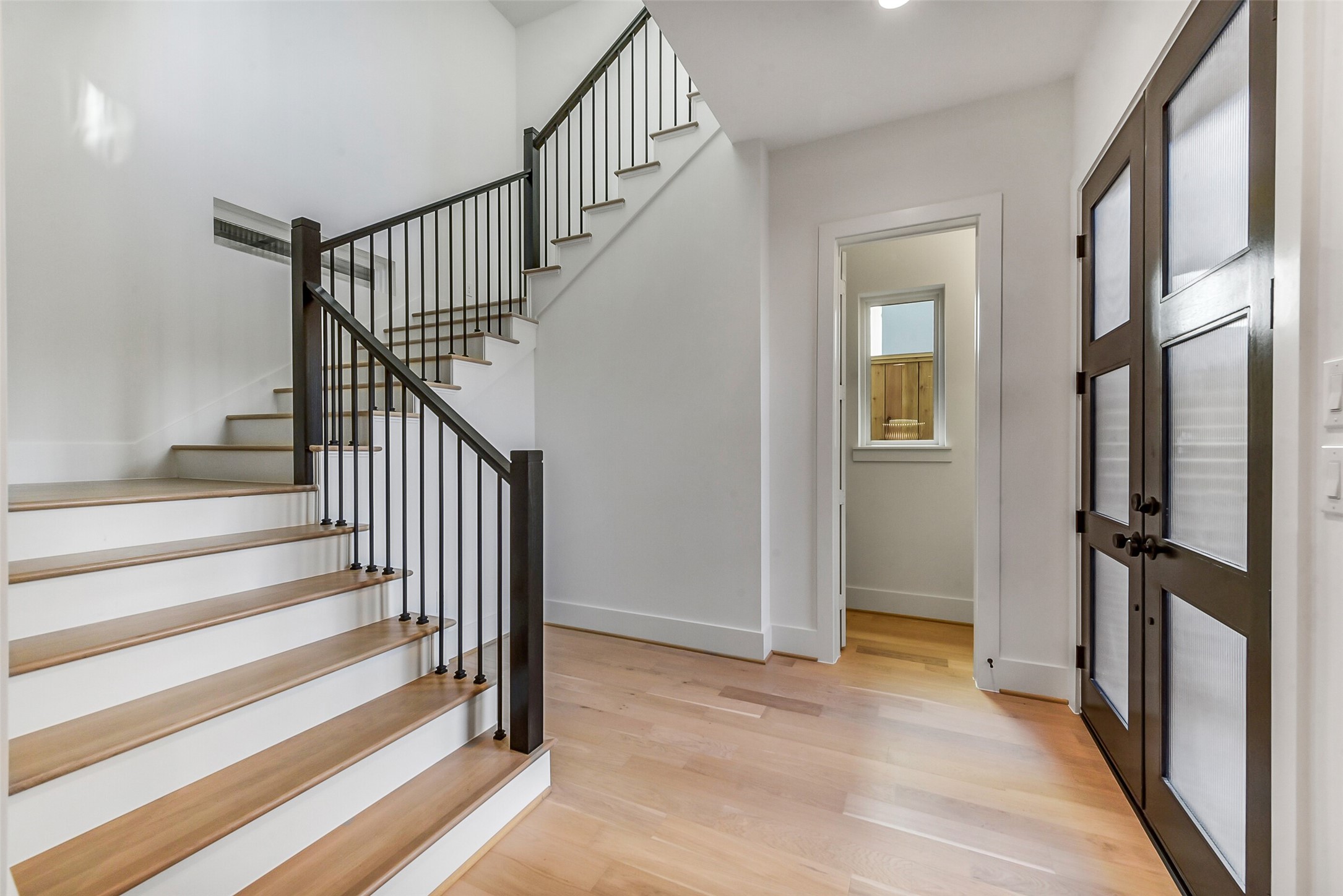 1902 Nantucket Drive Houston, TX 77057 - Photo 10 of 50 a view of an entryway with staircase