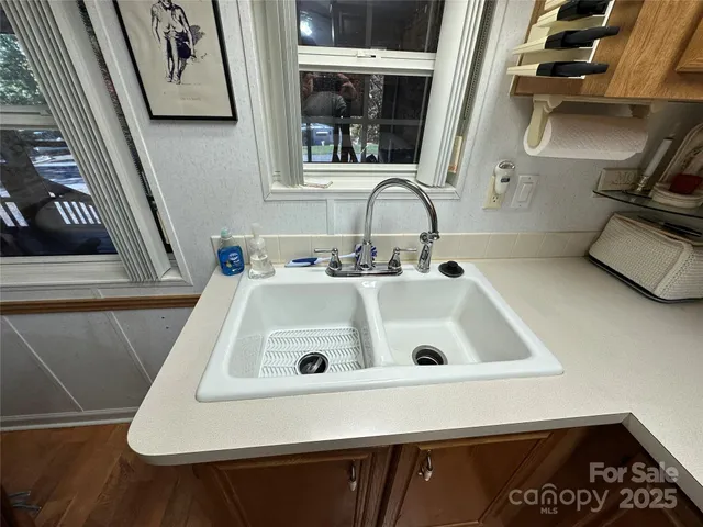 a bathroom with a sink and a washing machine