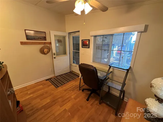 a view of a livingroom with furniture and furniture