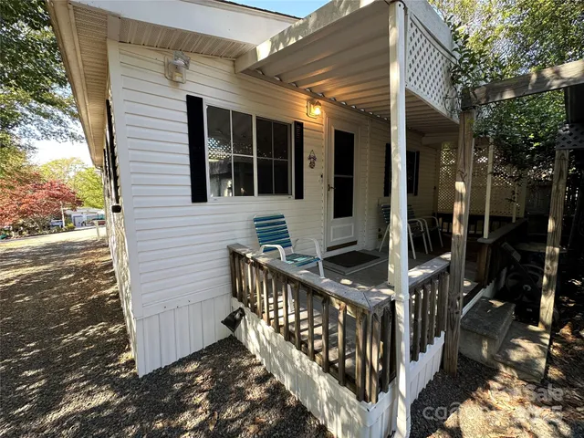 a view of a chairs and tables in patio