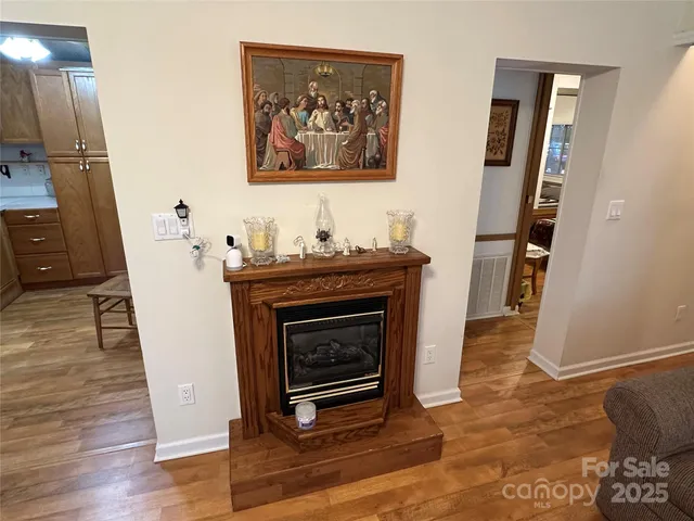 a room with furniture and a fireplace