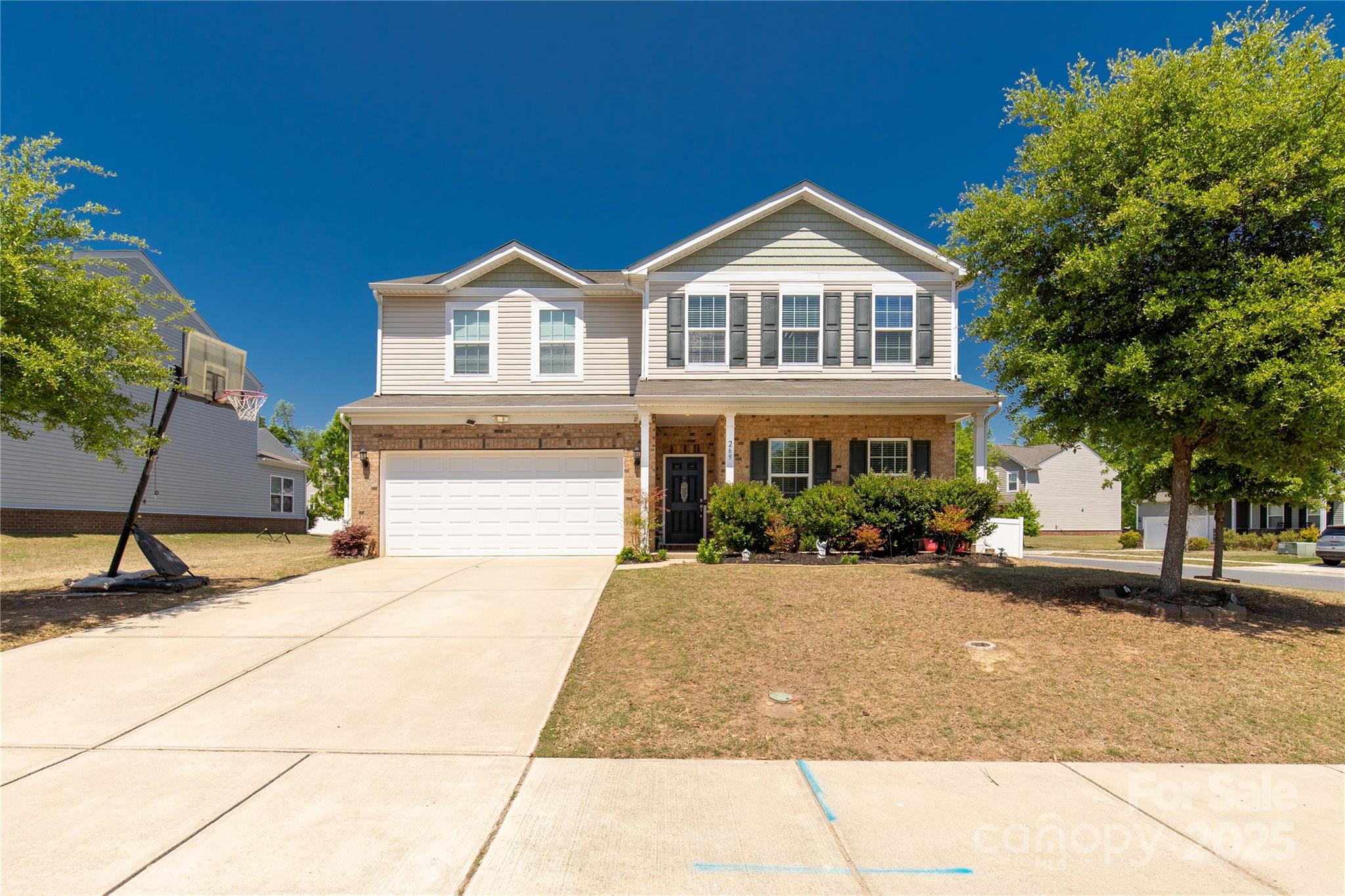 269 Keating Pl Drive Fort Mill, SC 29708 - Photo 1 of 48 a front view of a house with a yard