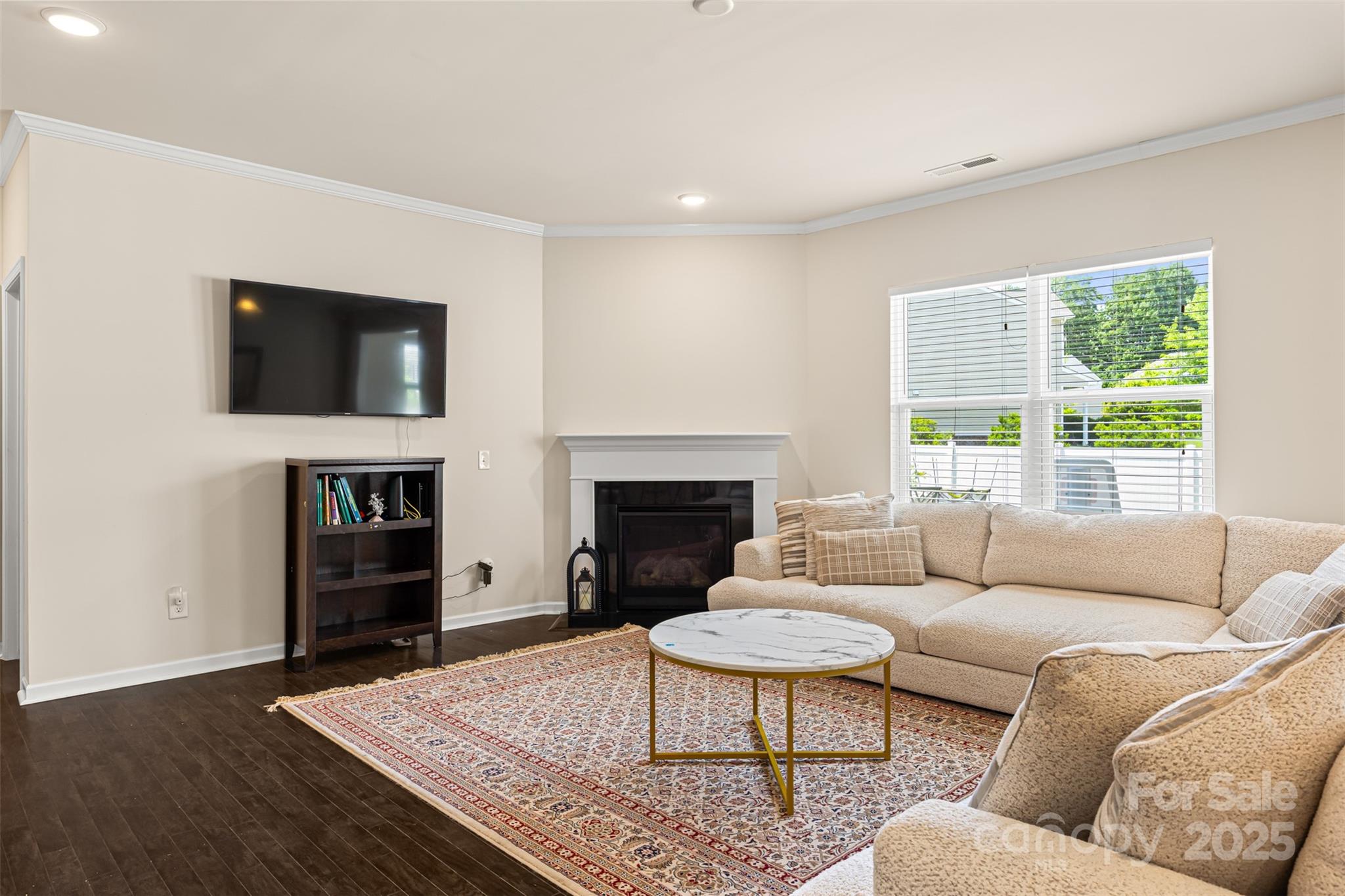 269 Keating Pl Drive Fort Mill, SC 29708 - Photo 11 of 48 a living room with fireplace furniture and a flat screen tv