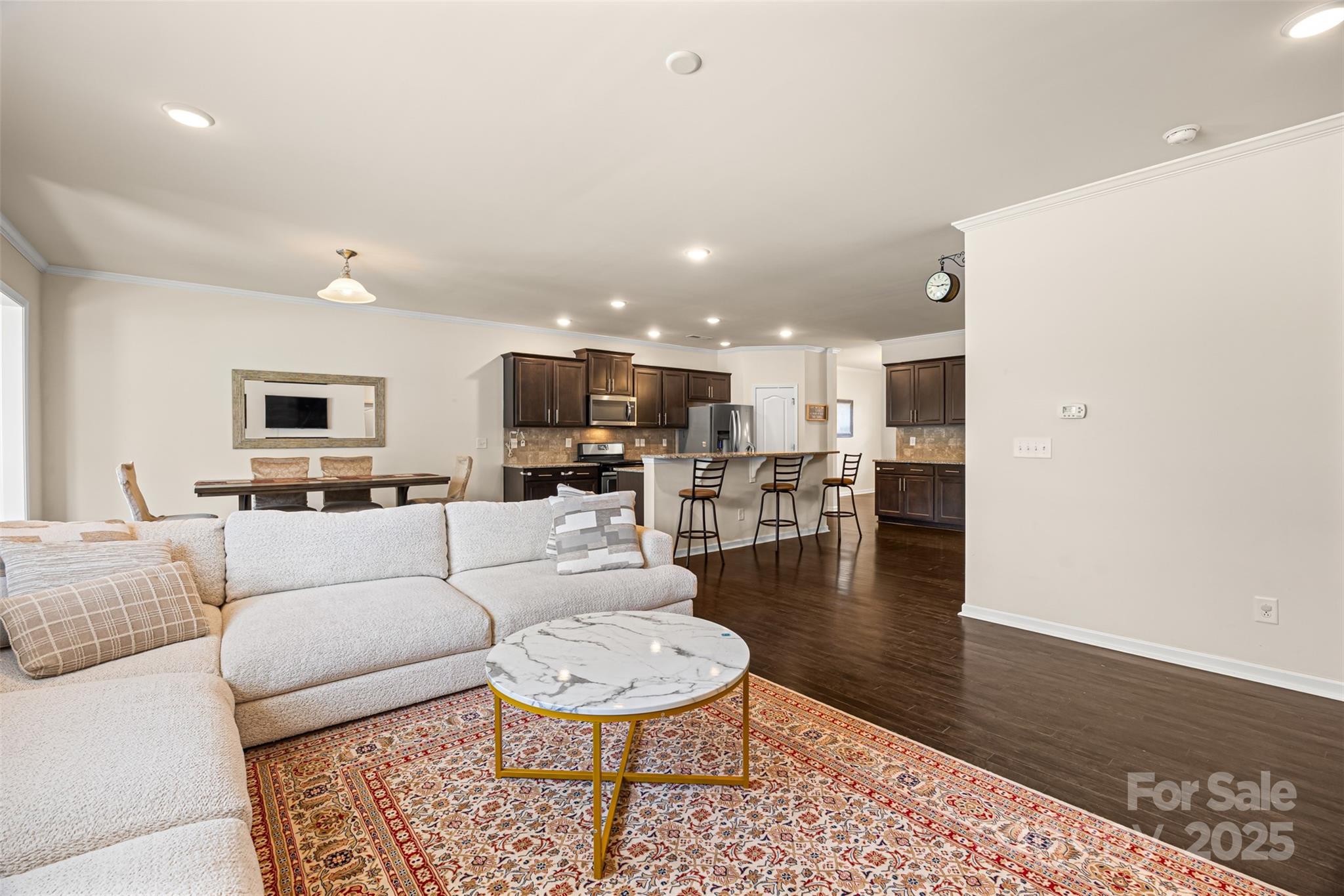 269 Keating Pl Drive Fort Mill, SC 29708 - Photo 14 of 48 a living room with furniture and a view of kitchen