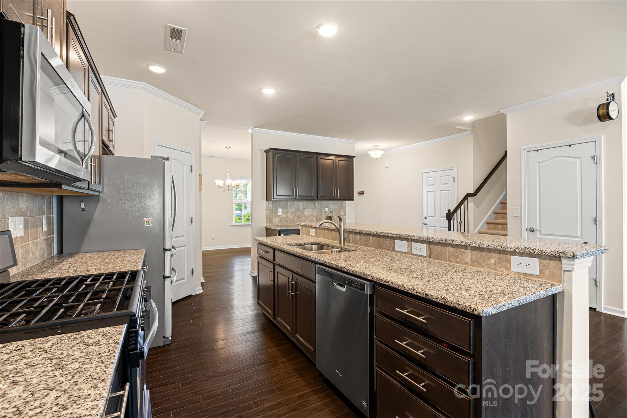 269 Keating Pl Drive Fort Mill, SC 29708 - Photo 19 of 48 a kitchen with a sink stove and refrigerator