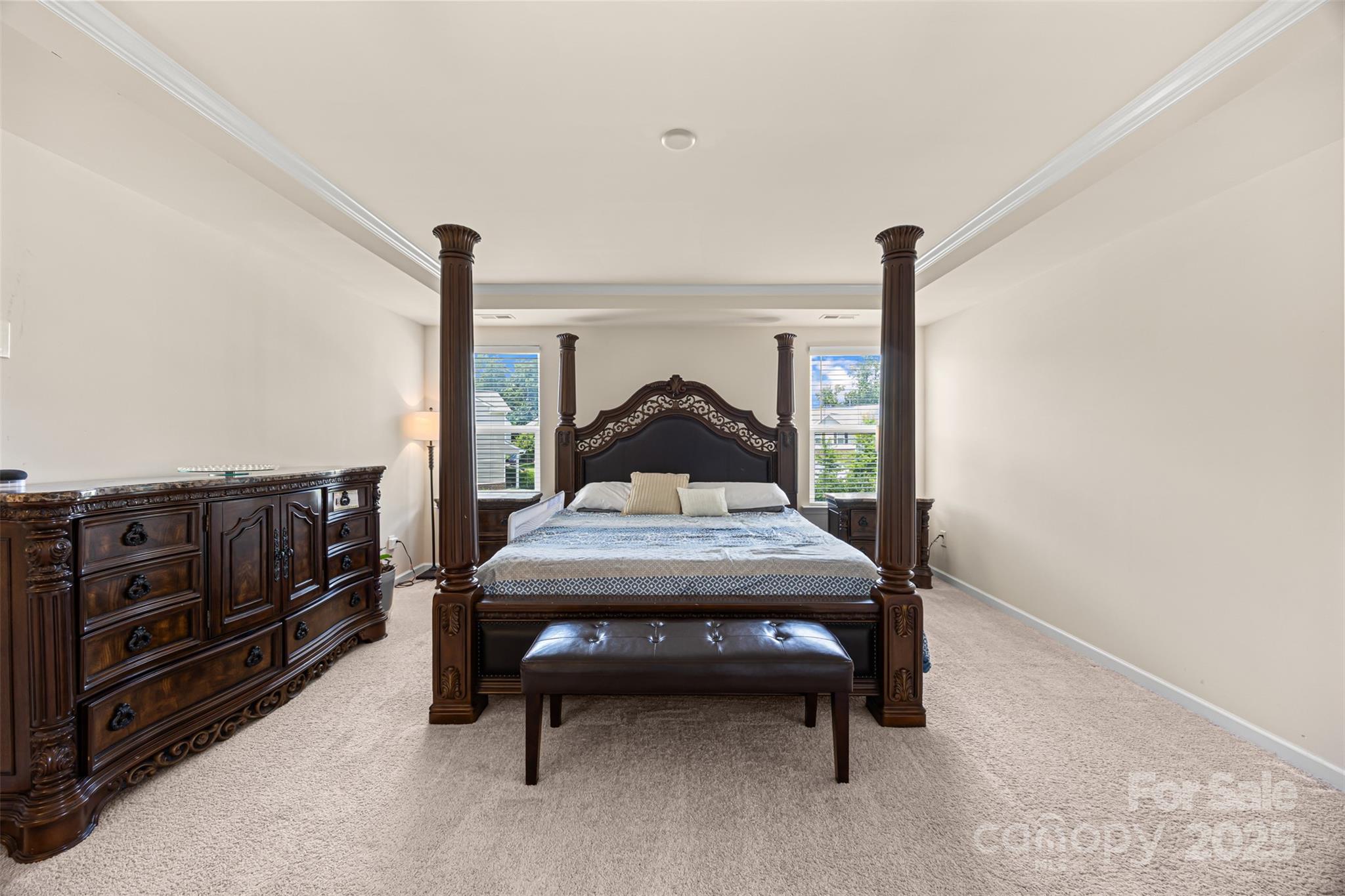 269 Keating Pl Drive Fort Mill, SC 29708 - Photo 30 of 48 a bedroom with a bed window and dresser