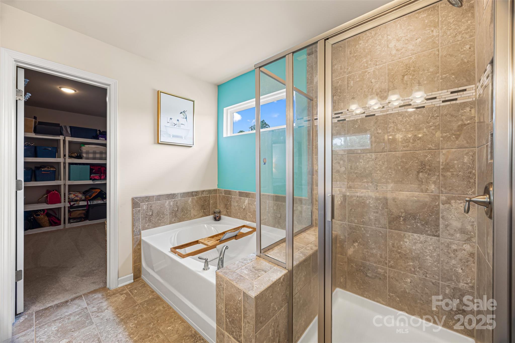 269 Keating Pl Drive Fort Mill, SC 29708 - Photo 34 of 48 a bathroom with a tub and a shower