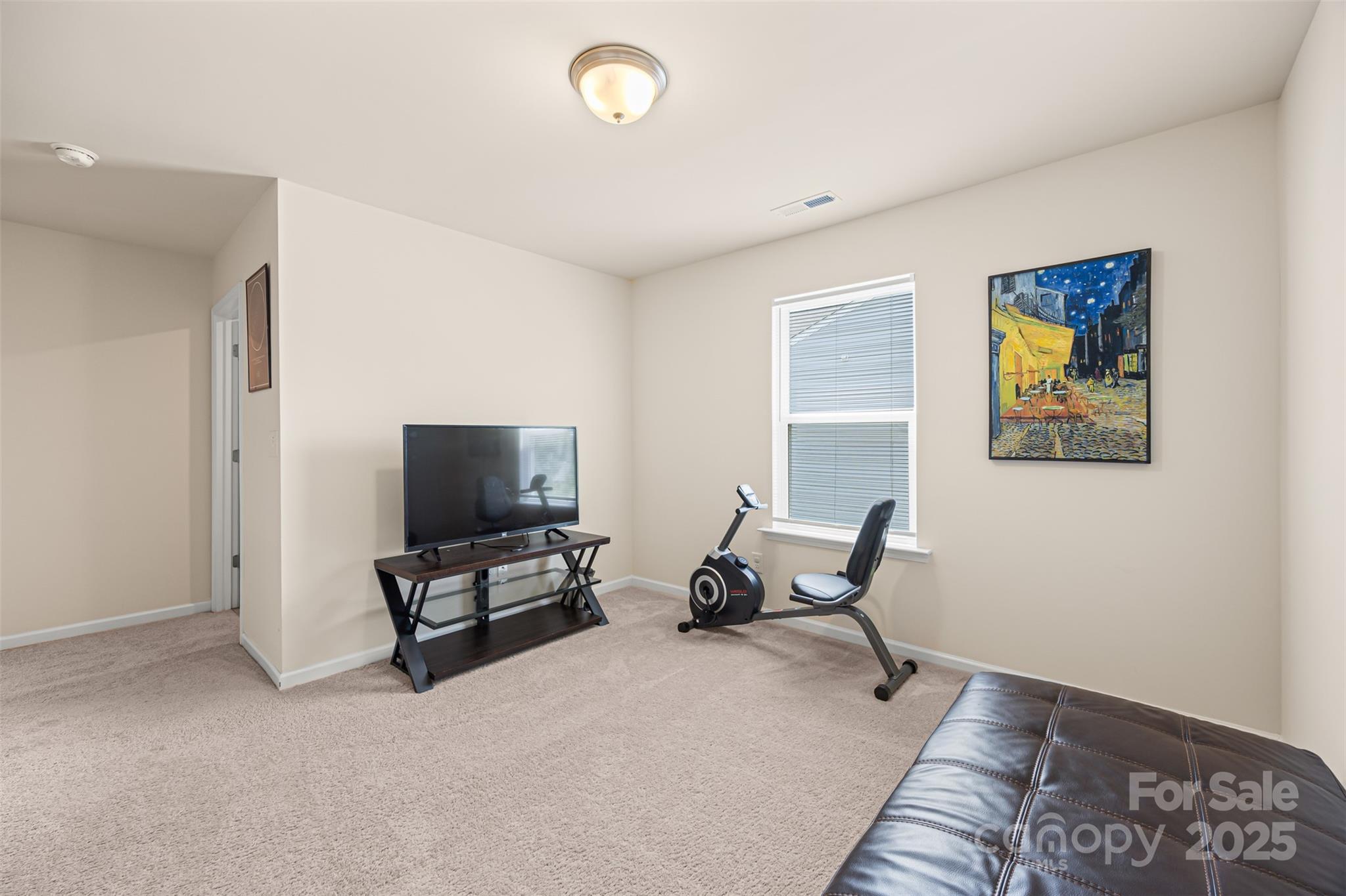 269 Keating Pl Drive Fort Mill, SC 29708 - Photo 35 of 48 a living room with furniture and a flat screen tv