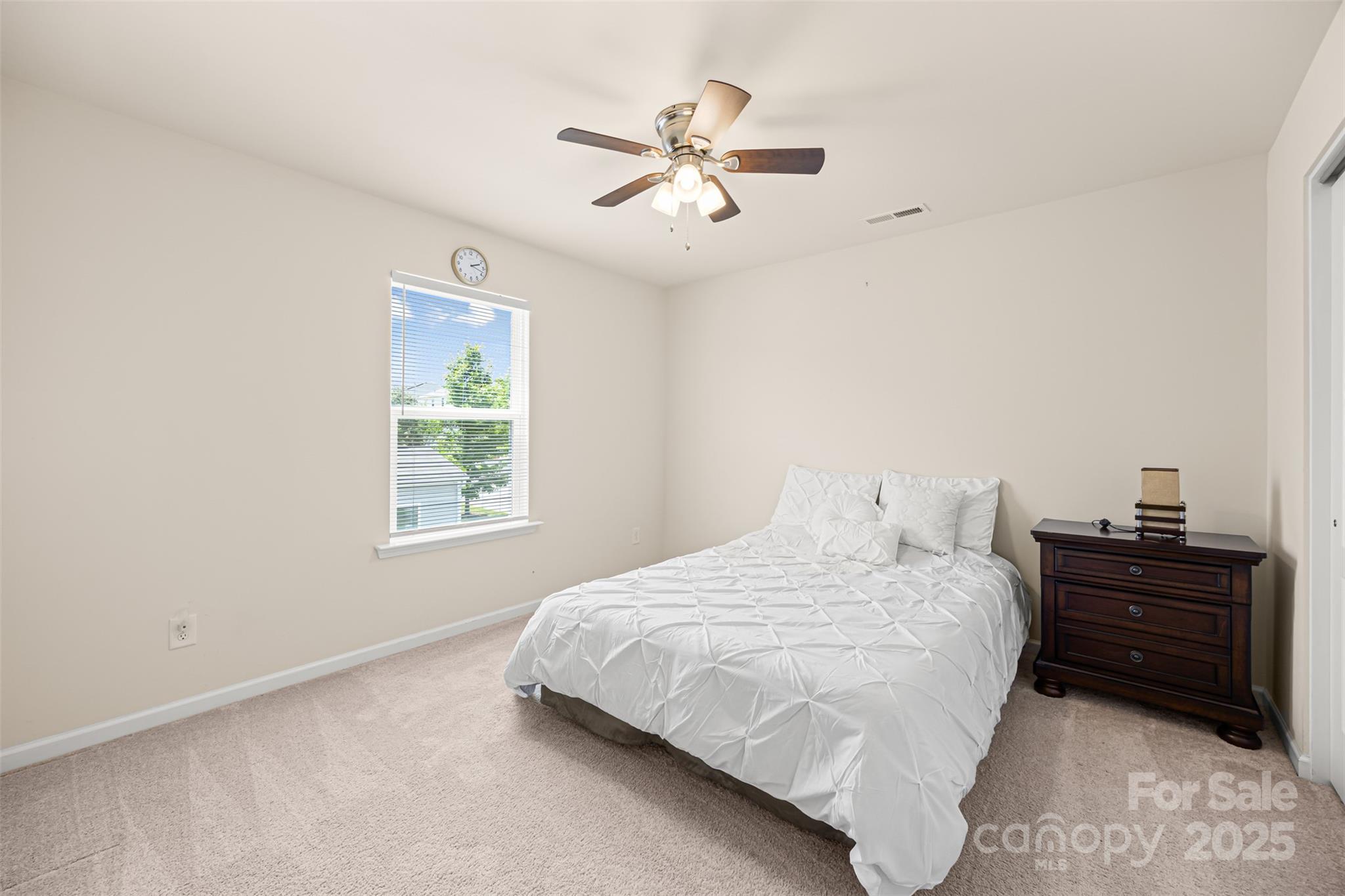 269 Keating Pl Drive Fort Mill, SC 29708 - Photo 36 of 48 a bedroom with a bed and window