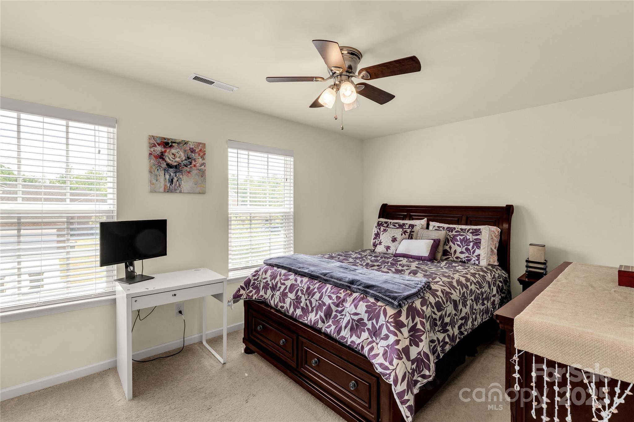 269 Keating Pl Drive Fort Mill, SC 29708 - Photo 41 of 48 a bedroom with a bed and a flat screen tv