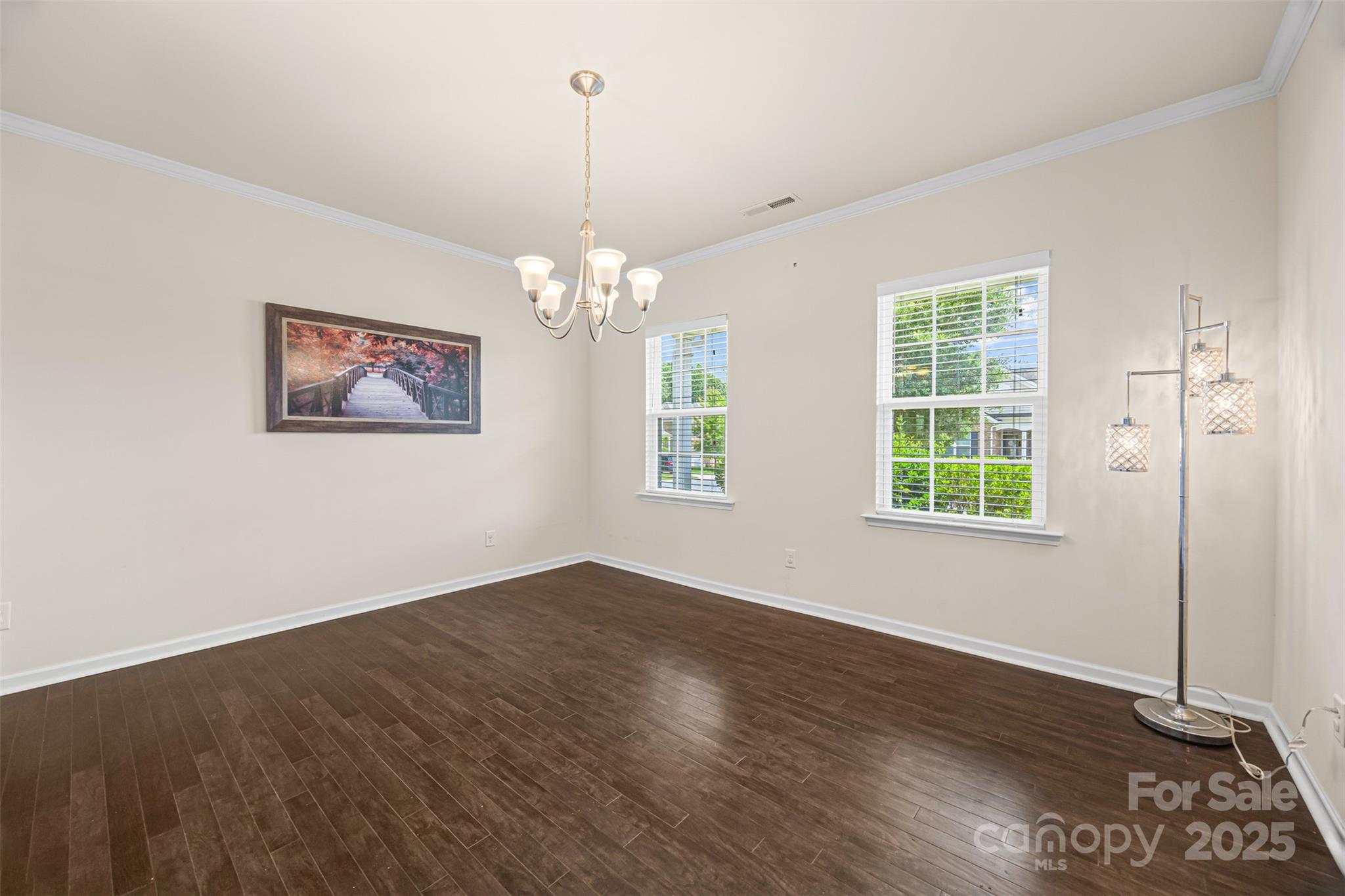 269 Keating Pl Drive Fort Mill, SC 29708 - Photo 5 of 48 a view of an empty room with wooden floor and a window