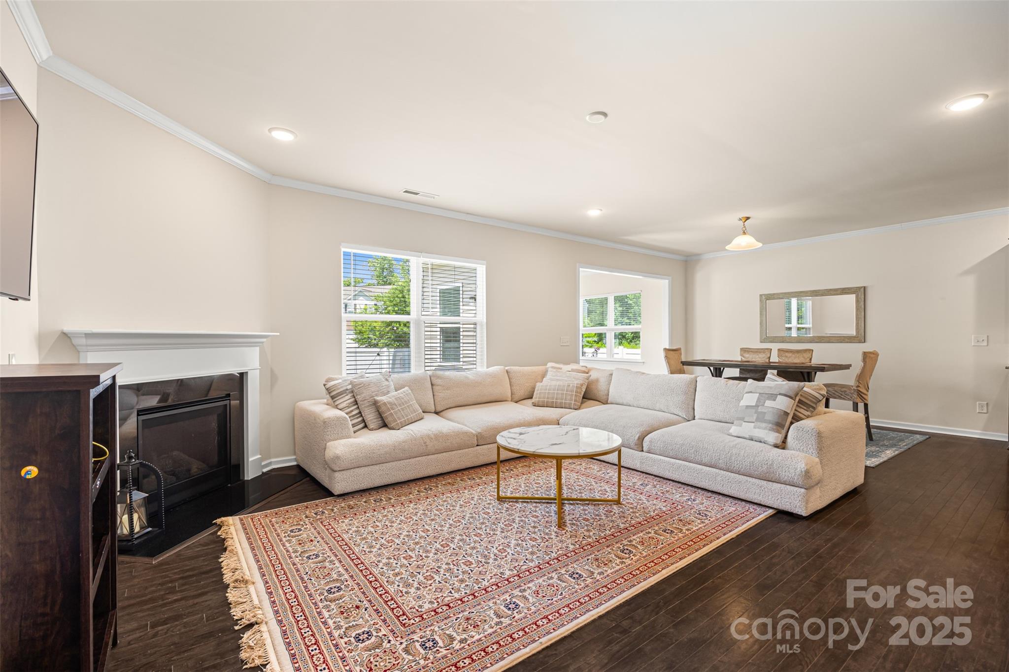 269 Keating Pl Drive Fort Mill, SC 29708 - Photo 8 of 48 a living room with furniture a fireplace and a table