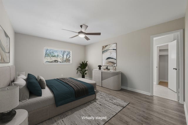 4615 Sidereal Drive Austin, TX 78727 - Photo 12 of 40 Bedroom featuring wood finished floors and a ceiling fan