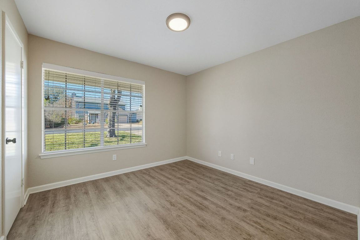 4615 Sidereal Drive Austin, TX 78727 - Photo 18 of 40 Secondary bedroom with walk-in closet