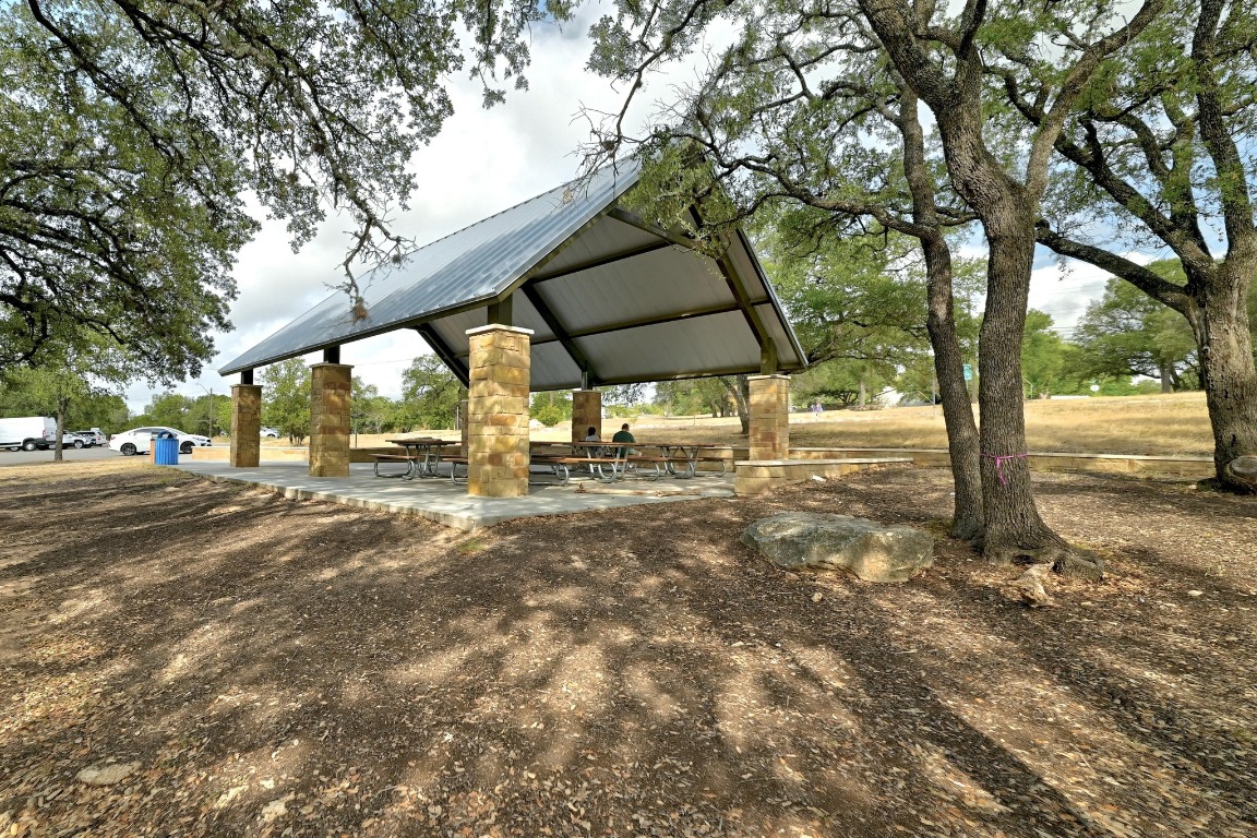 4615 Sidereal Drive Austin, TX 78727 - Photo 34 of 40 View of property's community featuring a patio area
